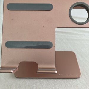 Phone charger and watch stand charger.